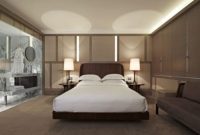Master bedroom with luxury design has king size bed with floating wooden bed frame