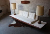 Mid century modern platform sofa meets