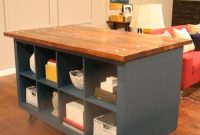 Take two ikea expedit bookcases, frame in mdf, paint, attach casters, and bolt