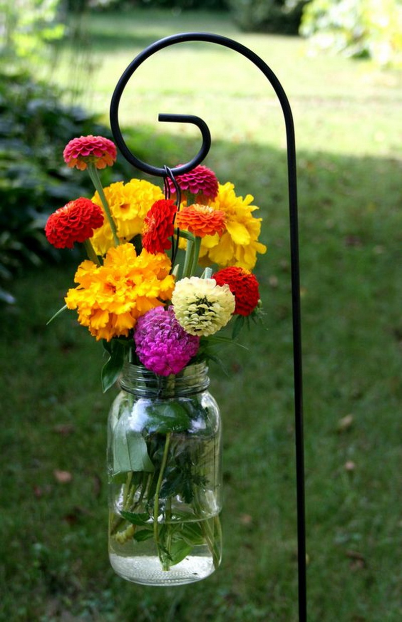 3. hanging jar filled with blooms