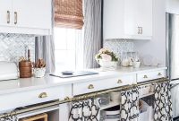 Modern black-and-white quatrefoil curtains on brass rod