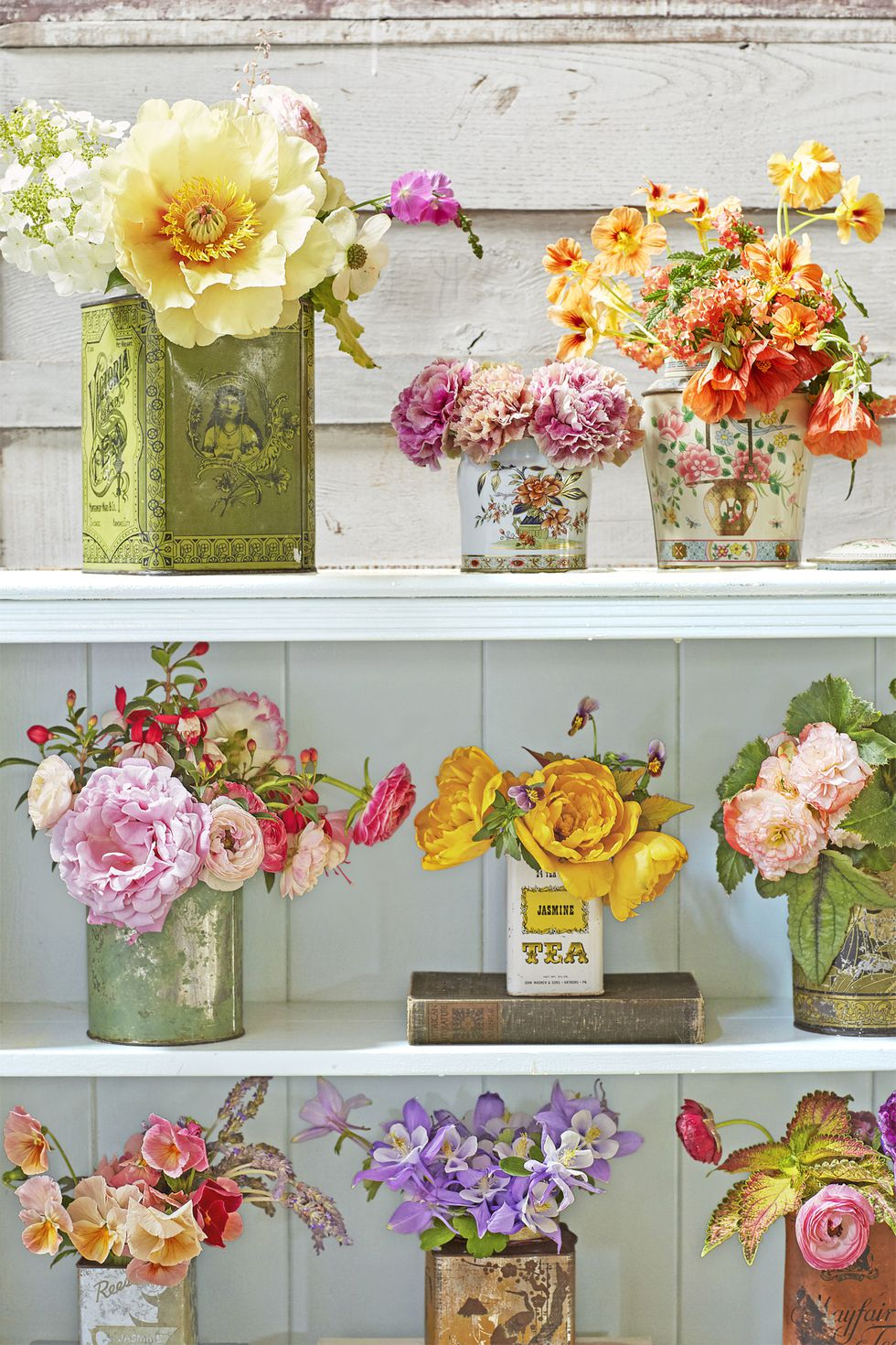 Vintage canister flower arrangements
