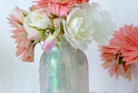 Fill mason jars with glitter
