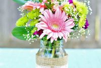 Lovely mason jars with rustic burlap accents