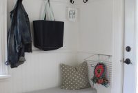 Storage bench with wall hooks