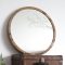 Adorable round mirror designs to brighten up your small space 04
