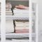 Ways to organizing your chaotic linen closet 16