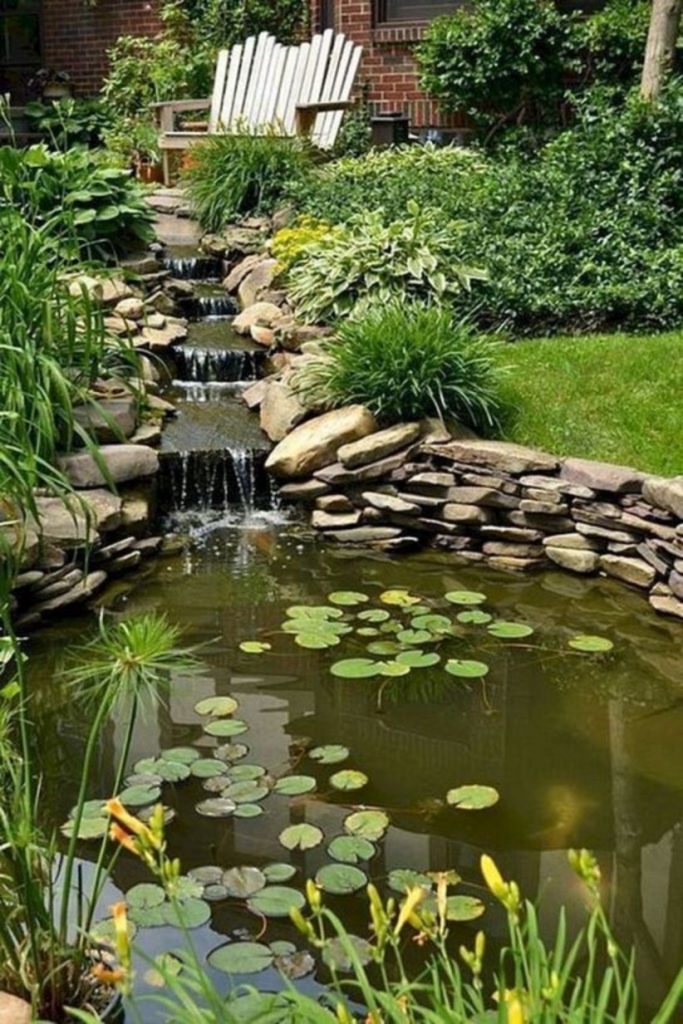Design a fish pond garden with a waterfall concept 03