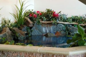 Design a fish pond garden with a waterfall concept 07