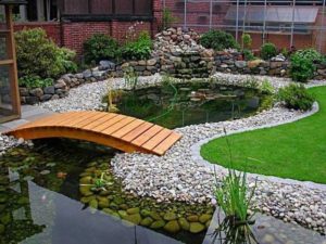 Design a fish pond garden with a waterfall concept 18