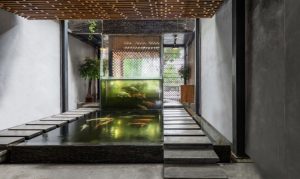Design a fish pond garden with a waterfall concept 37