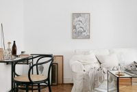 Design a living room in a small space that remains comfortablel 09