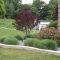 Garden exterior design ideas using grass that make your home more fresh 22