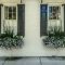 Exterior decoration ideas with flower in window 47