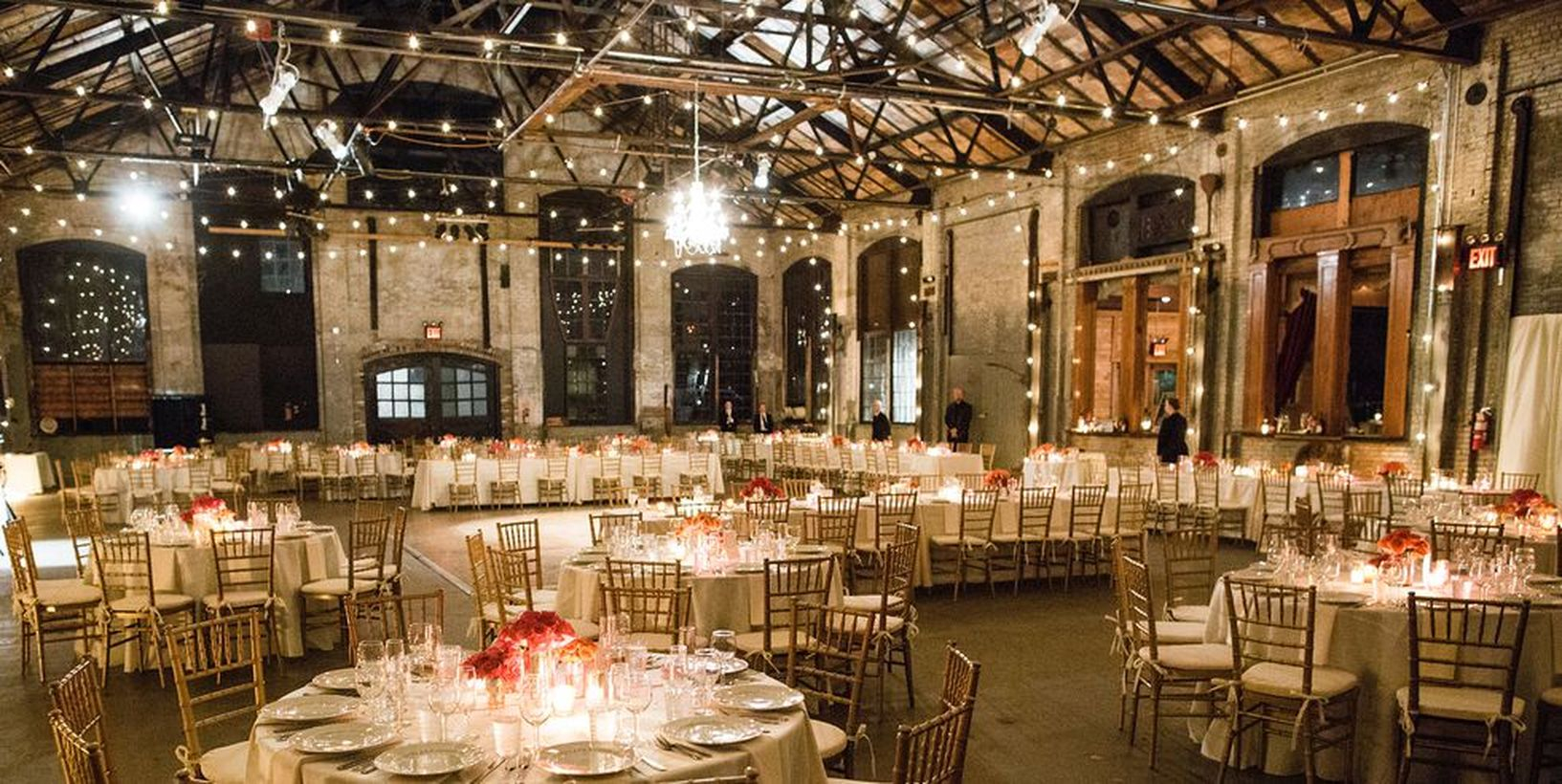 A comfortable indoor venue for fall wedding with basilica hudson features, industrial windows, brick walls, terracotta, ceiling, and tiles the perfect rustic setting for your big day.