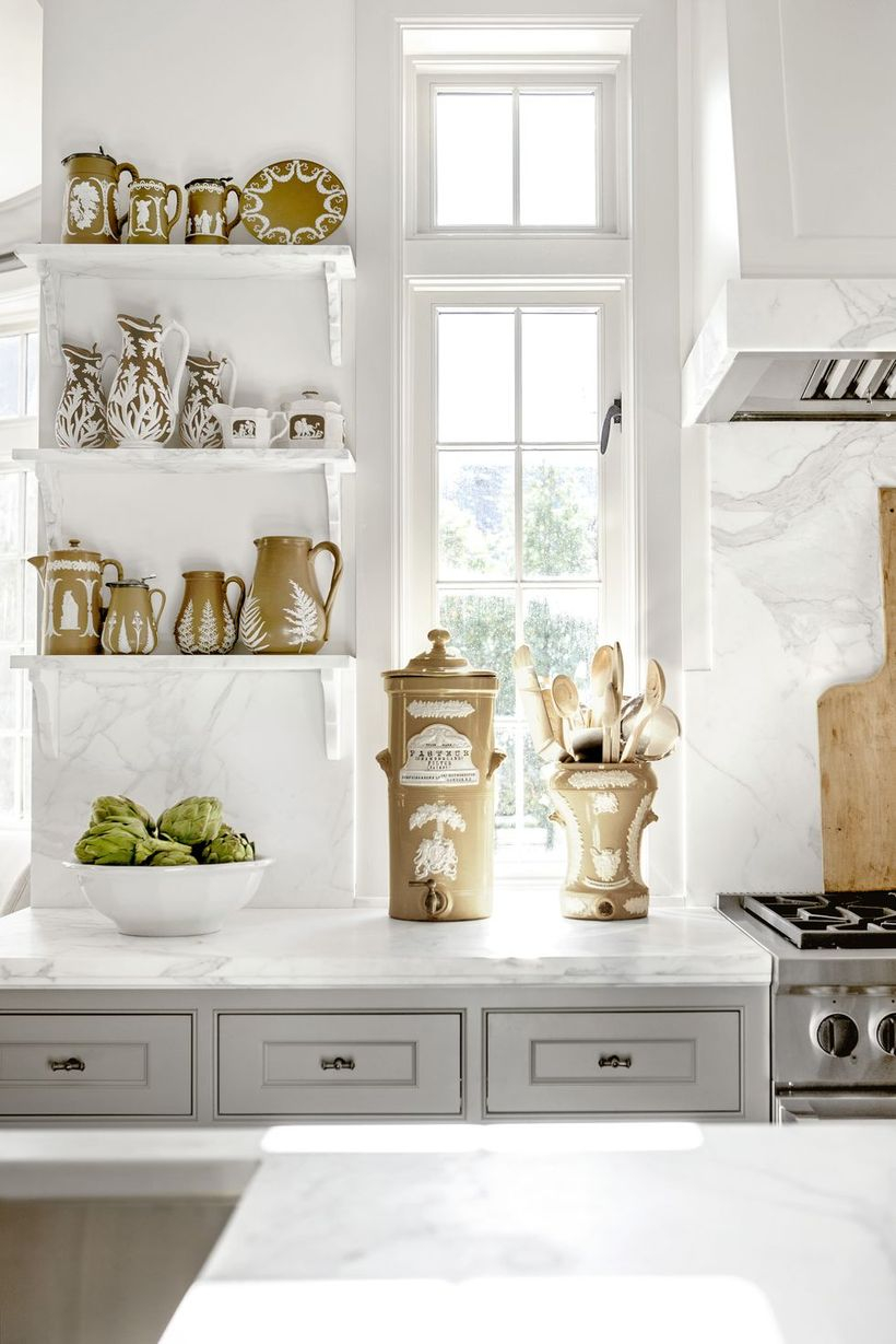 A magnificent indoor redecoration from summer to fall with caramel wall, small cabinet and small window that add a touch of warmth to the your kitchen