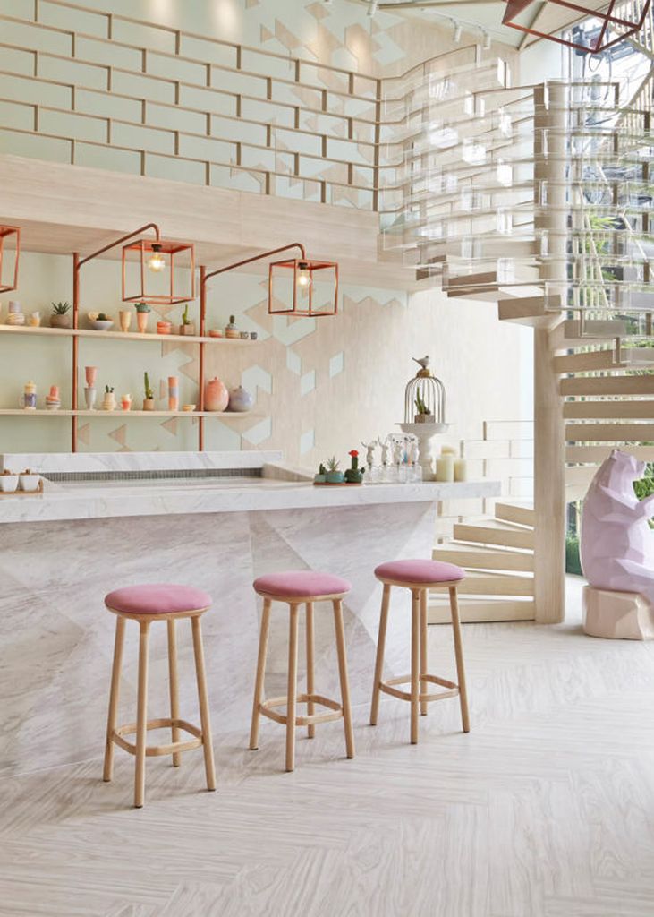 An amazing square copper lamps combined with bright walls to perfect your kitchen design