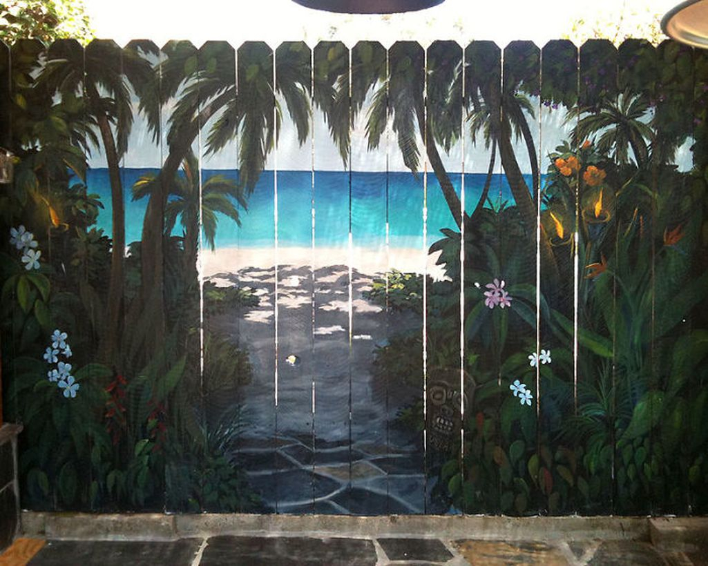 An awesome painting fence for garden with beach mural fence decor, a primer metal paint the top coat will last longer and the result is attractive.