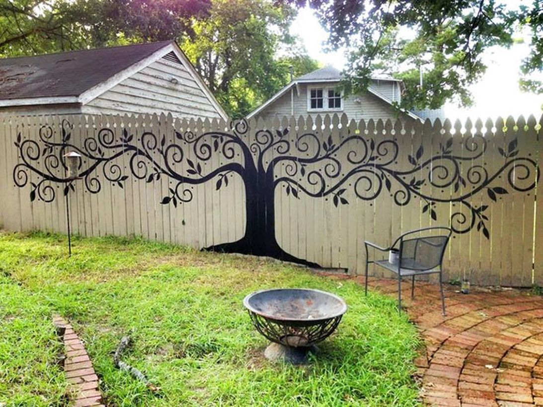 An impressive painting fence for garden with tree mural intricate paintings unique flower holders, these fences will sure make your neighbors jealous.