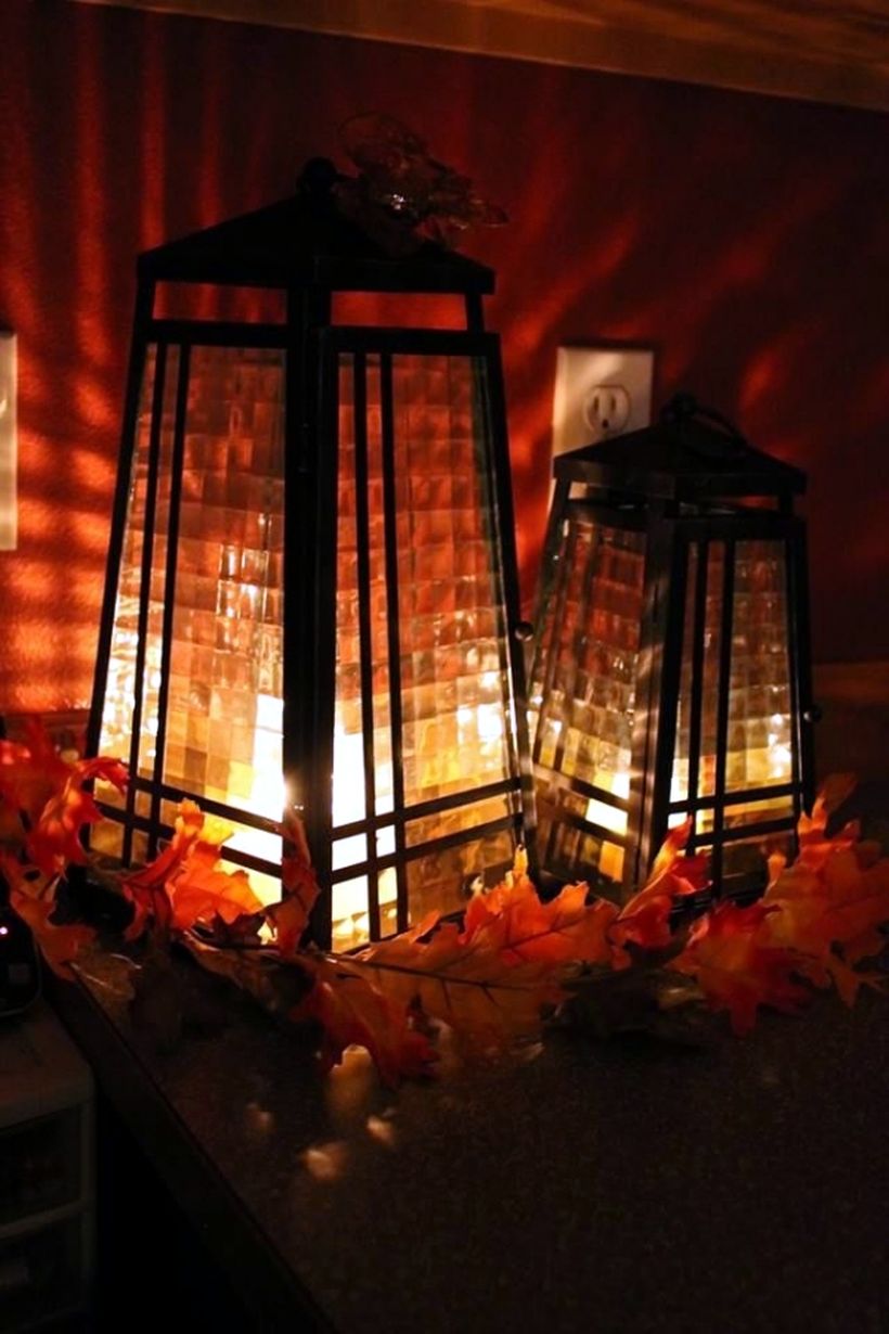 Arranged metal lantern with autumn fruits