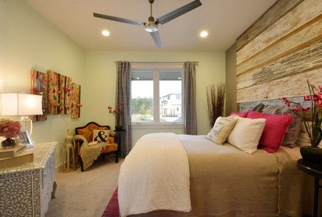 Beautiful bedroom with wooden headboard