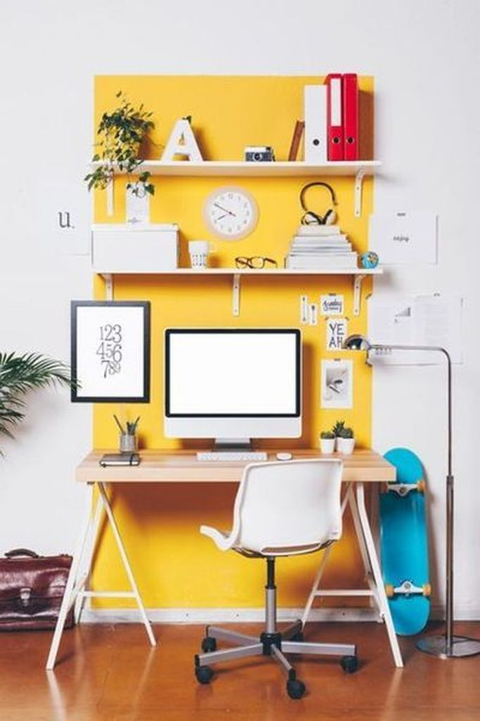 Beautiful white wall decoration combined with funky yellow accent to beautify your neutral office home