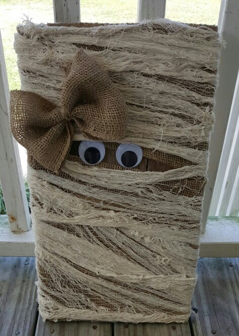 Diy pallet board with a unique pallet mummy to look cute for your porch