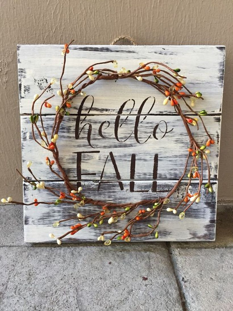 Diy pallet board with wreath white washed pallet