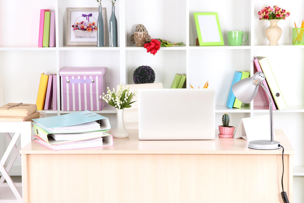 Get a classy, colorful look by combining bright neutrals with bold colors for your office home