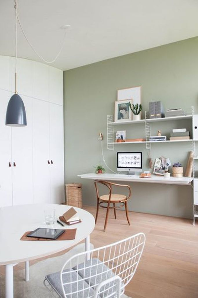 Lovely light green home office decoration combined with floating rack above table to perfect your neutral office home