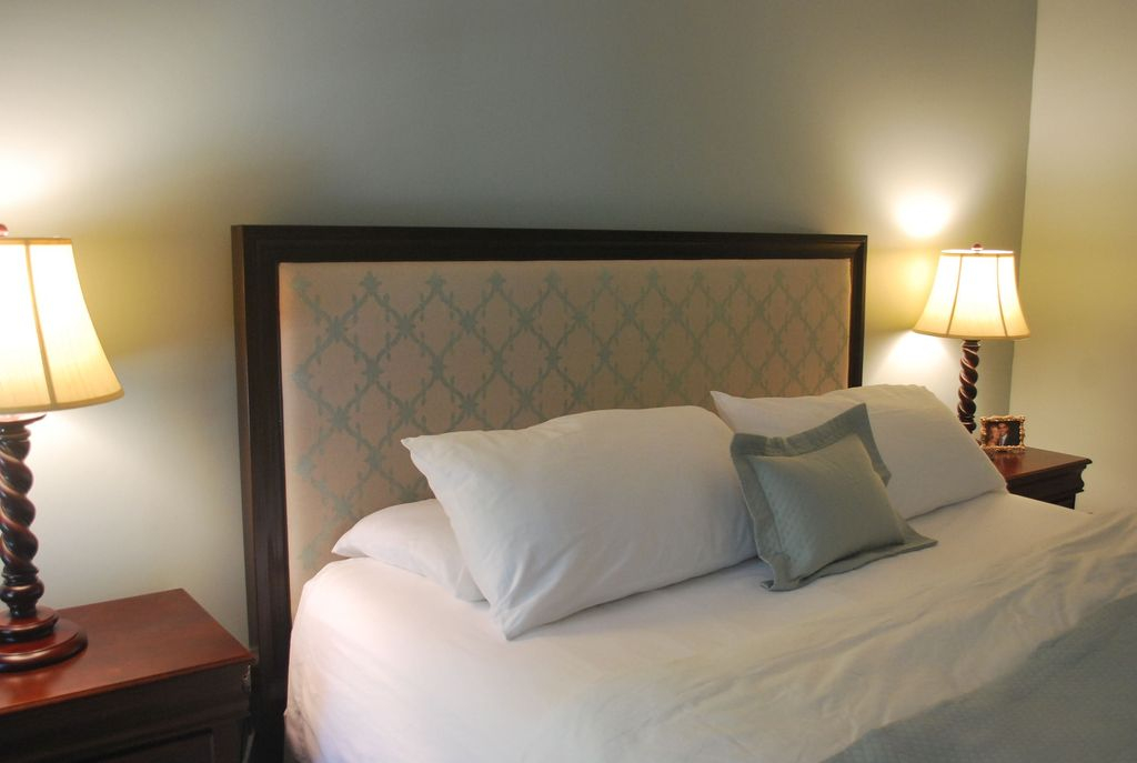 Modern bedroom with patterned headboard