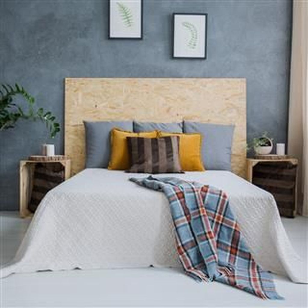 Modern bedroom with wooden headboard