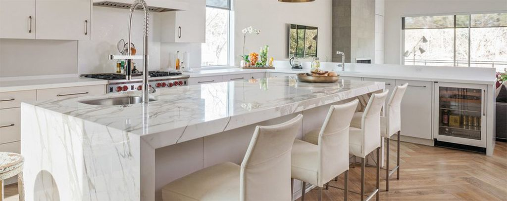Perfect kitchen design combined with white granite countertops and white walls to perfect your modern kitchen