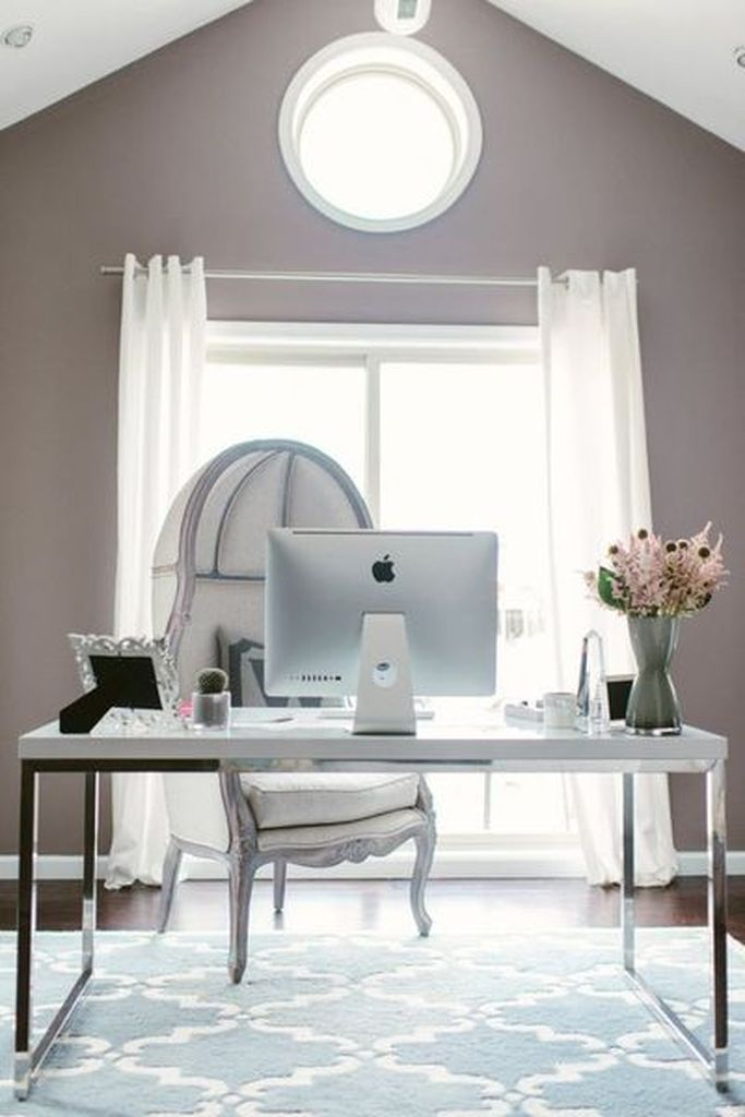 Sophisticated greige home office decoration combined with white curtain and a white chair to beautify your neutral office home