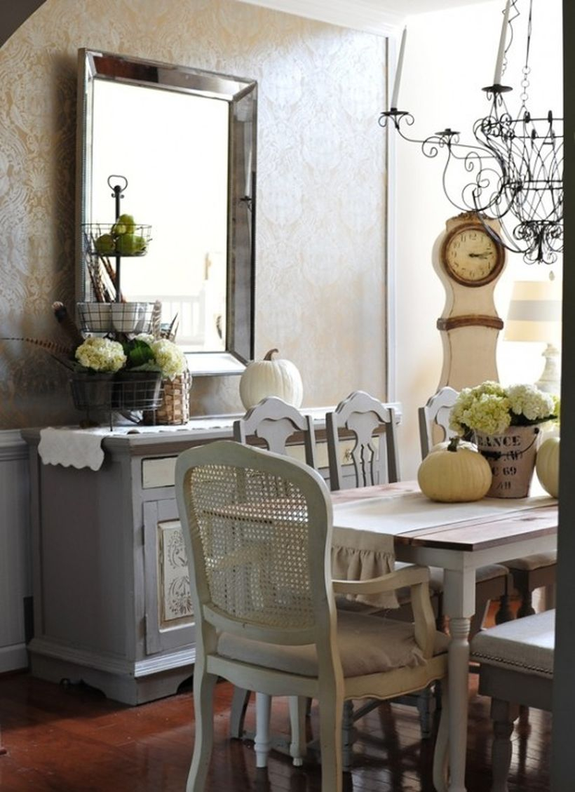 Little pumpkin and flower vase used for centerpiece on console table and square mirror in your dining room