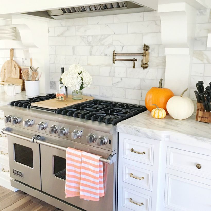 Pumpkins decoration on granite table kitchen to look fun this fall