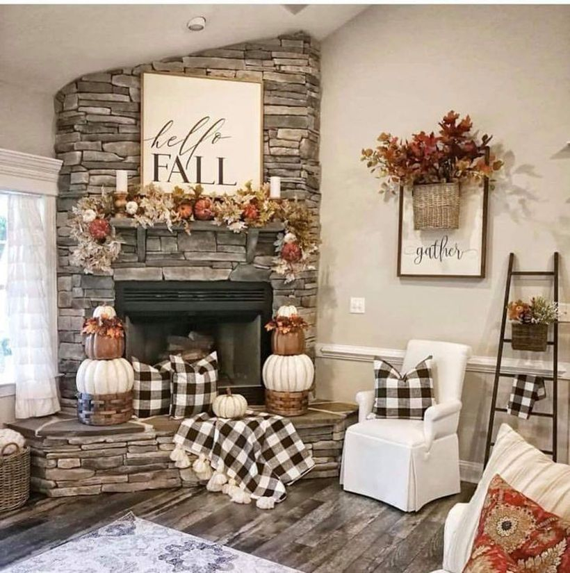 White and orange pumpkins decoration for fire pit at the corner