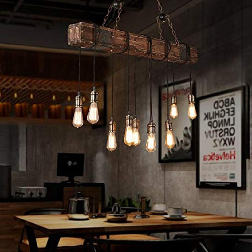 An attractive rustic chandelier for dining room with bubble chandelier adds drama to the dining room, buffet cabinet, wooden bench and wooden chairs. (2)