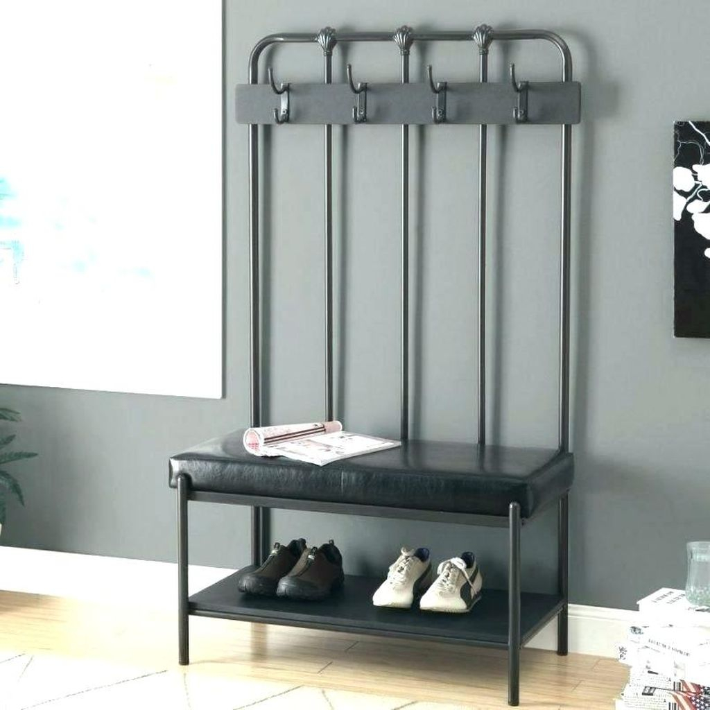An awesome entryway hooks combined with storage benches to perfect your modern entryway