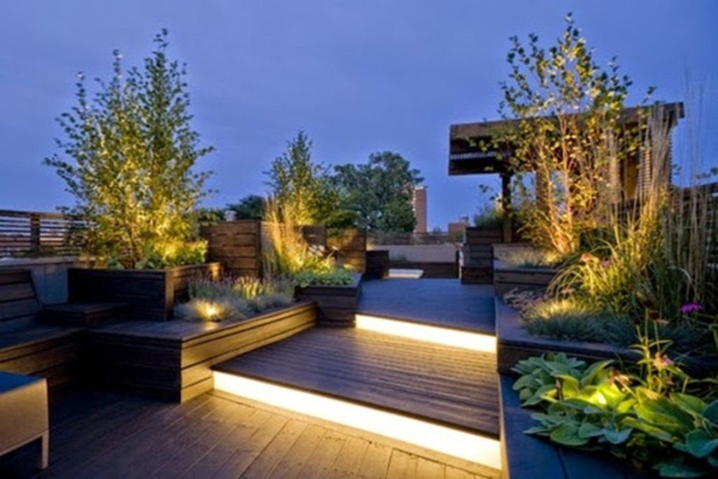 An incredible small rooftop lighting with staircase lights give a modern touch to the terrace decoration