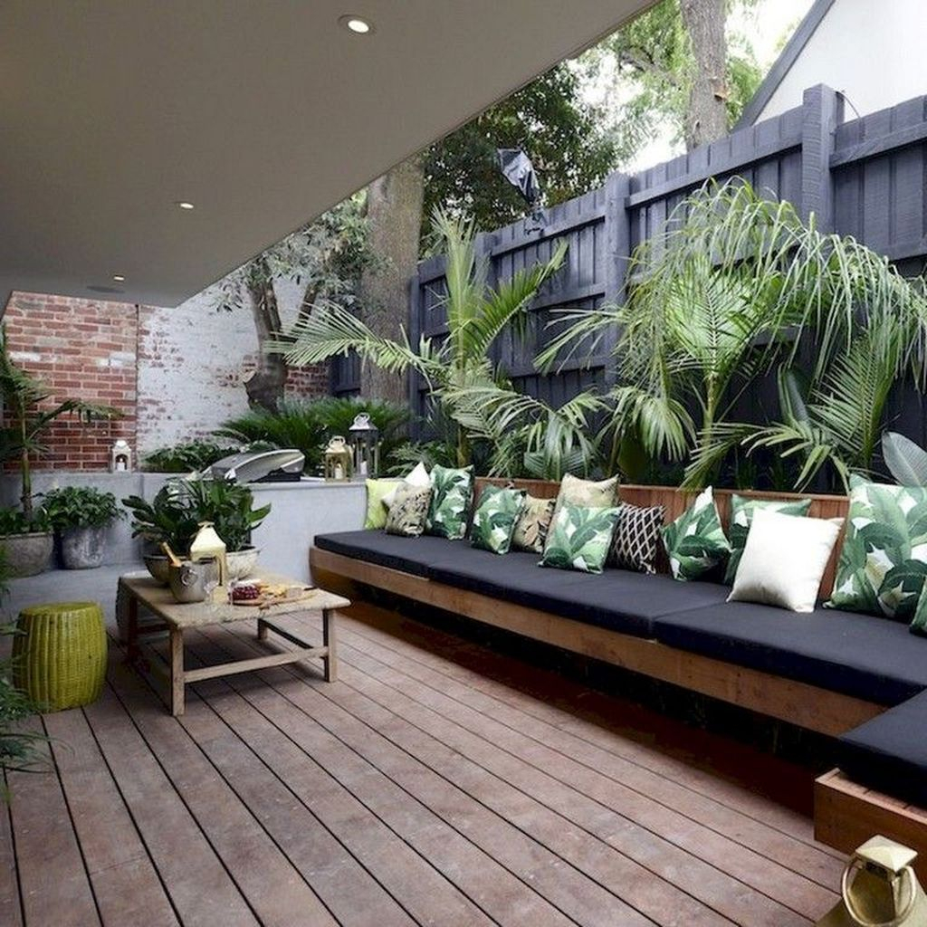 Bark bench combined with plants around it