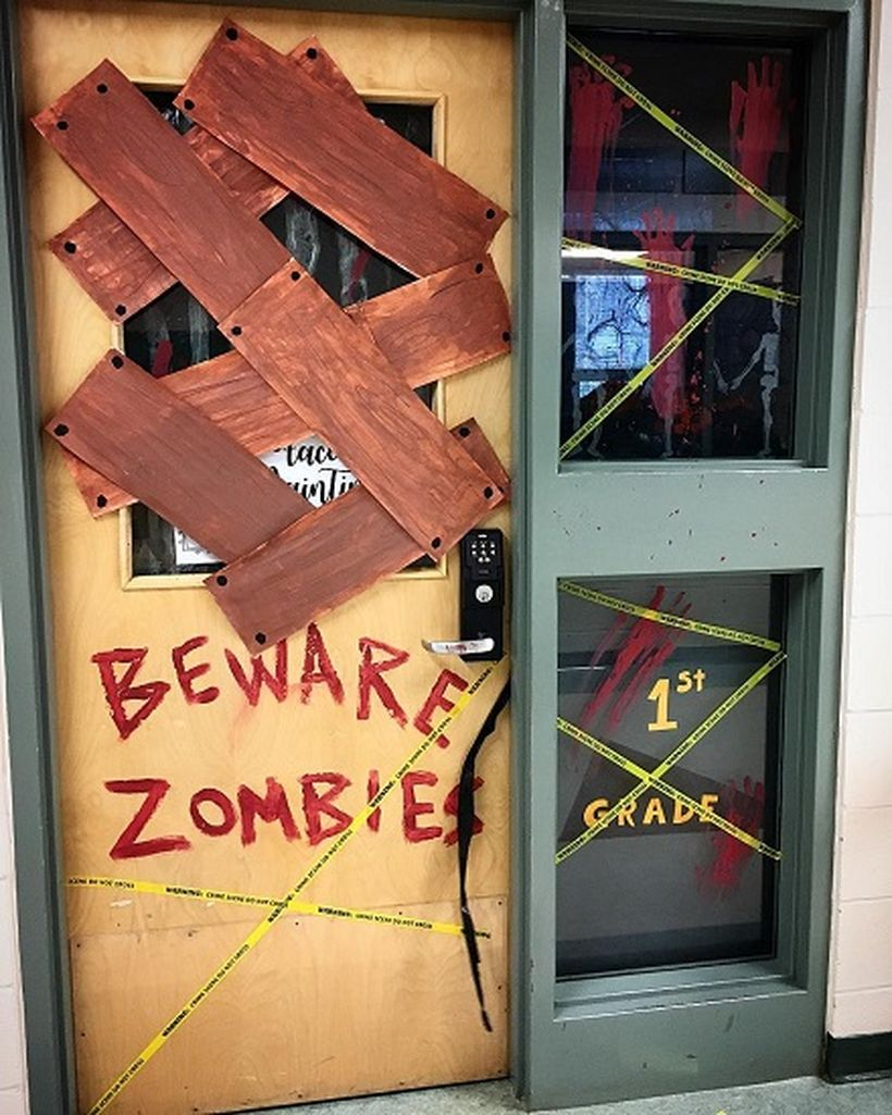 Bewere zombie halloween door.