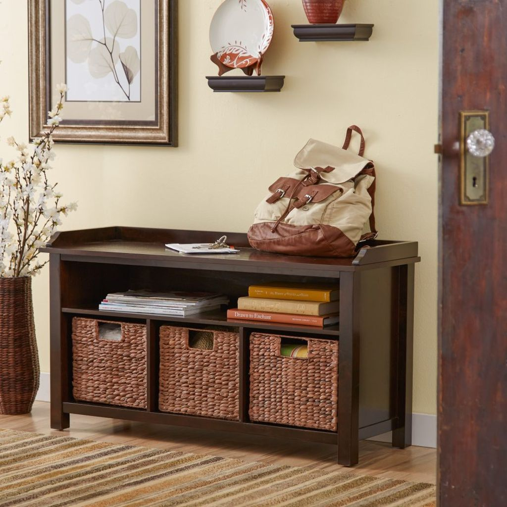 Classic wooden storage bench with storage basket below it and shelves book to complete your entryway decor