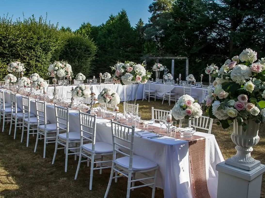 Fancy venue wedding decoration with arrangment urn flower to add romance