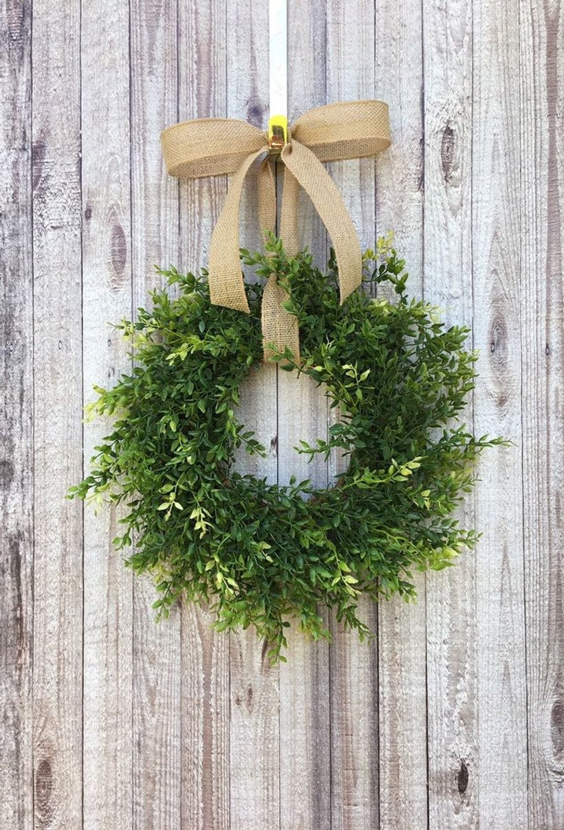 Farmhouse boxwood and burlap wreath with lush greenery and the rustic burlap bow to create rustic nuance