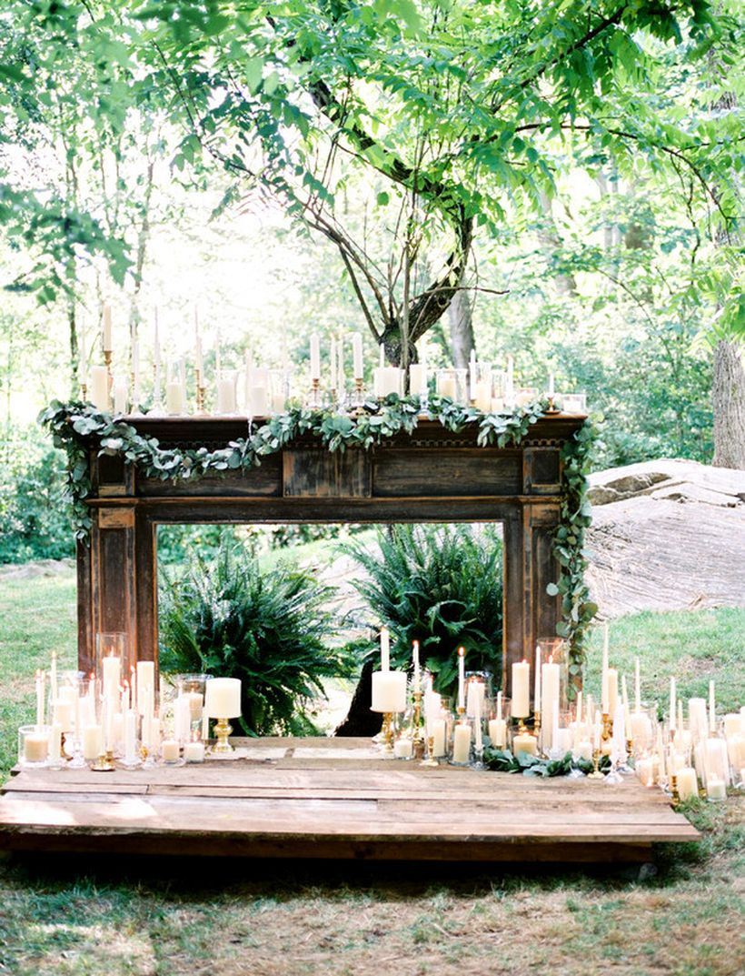 Fireplace mantels are the perfect opportunity for wedding candle decoration