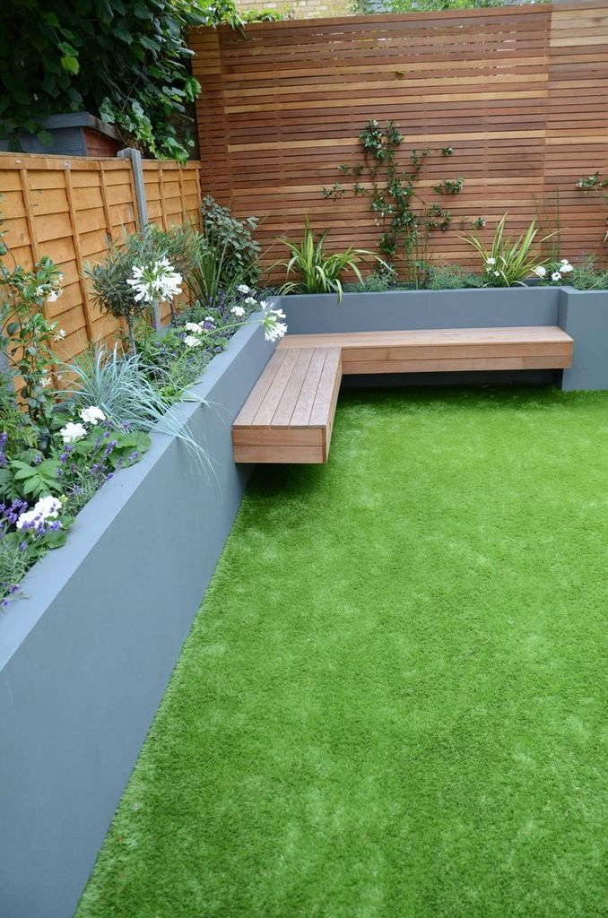 Garden design with wooden bench at the corner