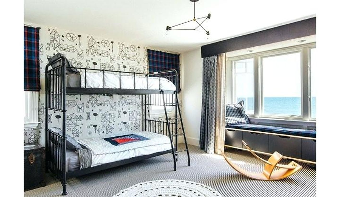 Gorgeous boys room decoration with gray mattress, white blanket, gray pillow, wall pattern decoration to look modern