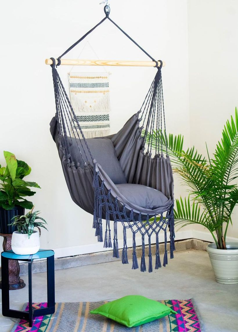 Gray macrame swing chair.