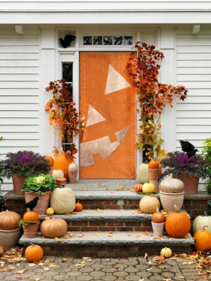 Half a pumpkin halloween door.